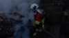 Ukraine -- Rescue workers at the site of Russian strike, Kyiv, 7Apr2025